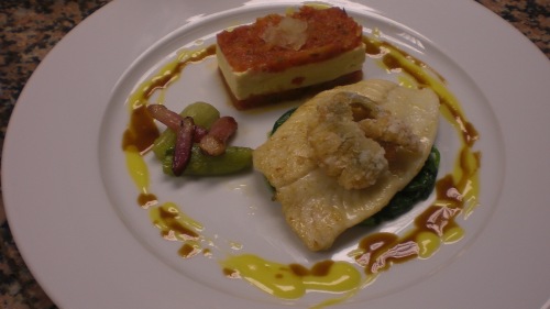 My main dish:  A Pan-fried turbot filet on a bed of spinach topped with fried turbot fins. Glazed pink radishes and baby fennel.  A tomato millefeuille layered with Concasser tomatoes, a yellow tomato custard royale, and a langoustine mousseline.  2 sauces to accompany: a passion fruit beurre blanc and a reduced langoustine jus. 